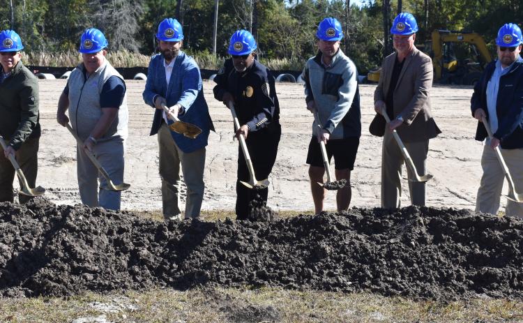 From left, Bryan James, B. James Construction (general contractor); Benjamin Starks, senior project manager, Jericho Design Group (architect); Kingsland Mayor Grayson Day; Kingsland Police Chief Rickey Evans; Alex Blount, Kingsland City Council; Paul Chamberlin, Kingsland City Council; and Kingsland City Manager Lee Spell break ground on the new city police headquarters.