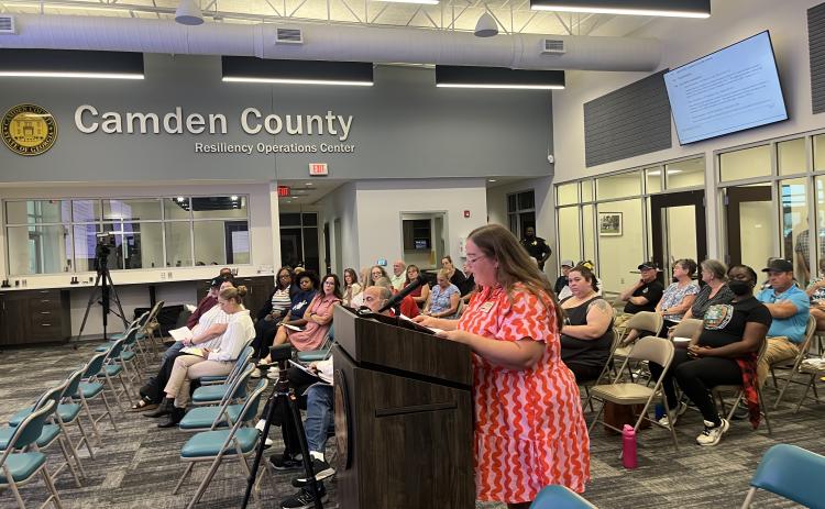 One Hundred Miles’ South Coast Advocate Kat Montgomery speaks Monday night in favor of a moratorium on data centers in Kingsland.