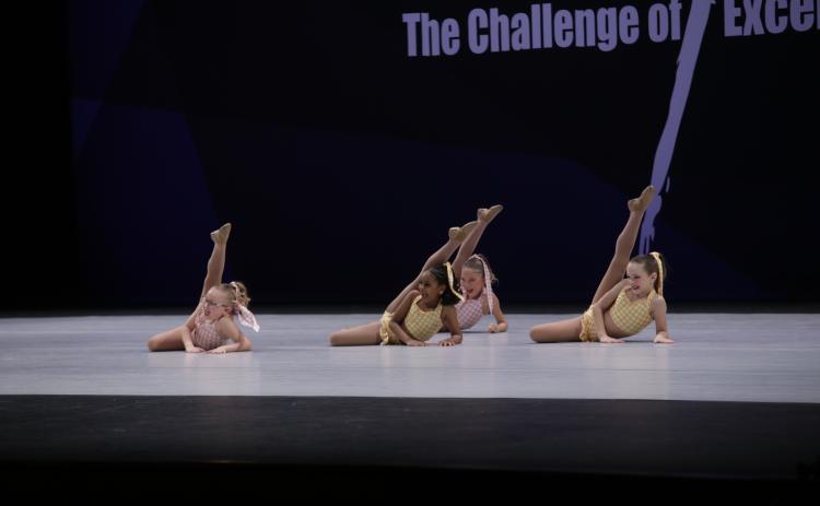 Caroline Mills, Asokha Tyson, Brielle Boeskool and Lucia Pulley perform “Vacation.”