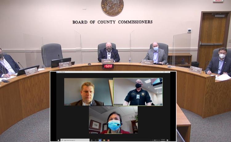 Nassau County commissioners, including Aaron Bell via the Internet, listen to Nassau County Emergency Management Director Greg Foster provide an update on COVID-19 and vaccinations.