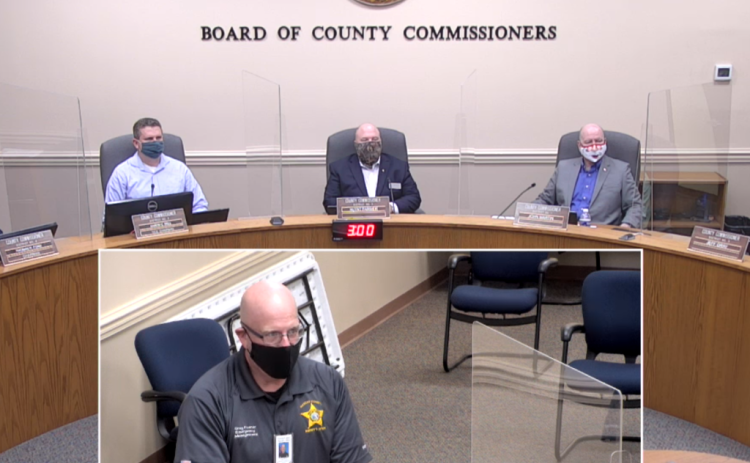 Nassau County Emergency Management Director Greg Foster addresses the Nassau County Board of County Commissioners meeting Monday. GARY D. MORGAN/FOR THE NEWS-LEADER