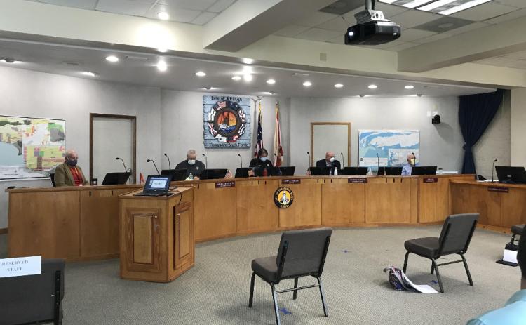 The Fernandina Beach City Commission donned masks and Commission Chambers were reconfigured with seats six feet apart to conform to social distancing for the first in-person meeting of the City Commission since rules regarding public meetings were relaxed by Gov. Ron DeSantis. JULIA ROBERTS/NEWS-LEADER