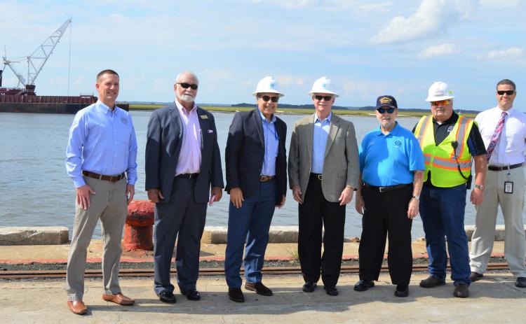 From left, Armand Riehl, senior project manager with Great Lakes Dredge & Dock Company; Ocean Highway and Port Authority Vice Chairman Mike Cole; Port of Fernandina Director Christopher Ragucci, who is also CEO of Worldwide Terminal Fernandina; Rutherford; Ocean Highway and Port Authority Chairman Danny Fullwood, Port of Fernandina Terminal Manager Roy E. Nelson; Beau Corbett, a project manager with the Army Corps of Engineers Jacksonville Office.  John Schaffner/For the News-Leader