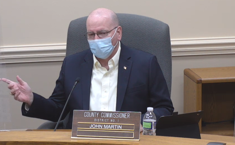Nassau County Commissioner John Martin asks a question during the BOCC’s Monday meeting.
