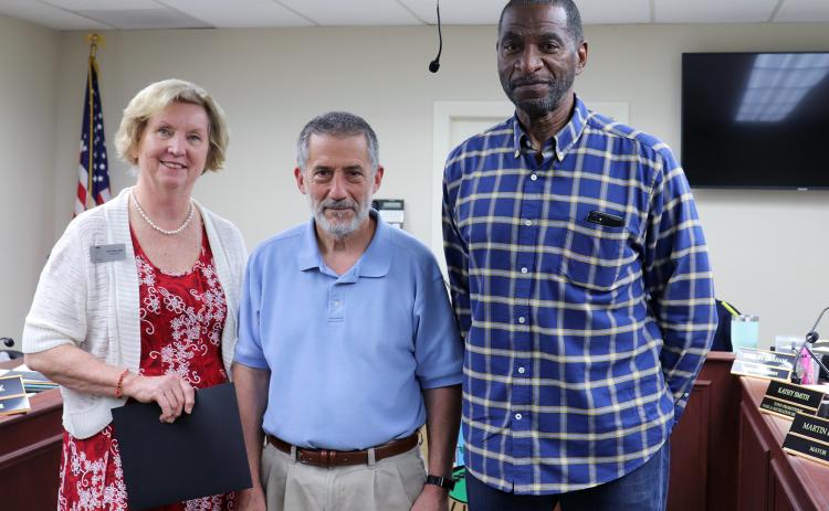 Take Stock in Children Board Member Dotti Williams joins Callahan Mayor Marty Fontes and TSIC College and Success Coach Johnnie Green for a proclamation Monday night, highlighting March as “Take Stock in Children Month.”