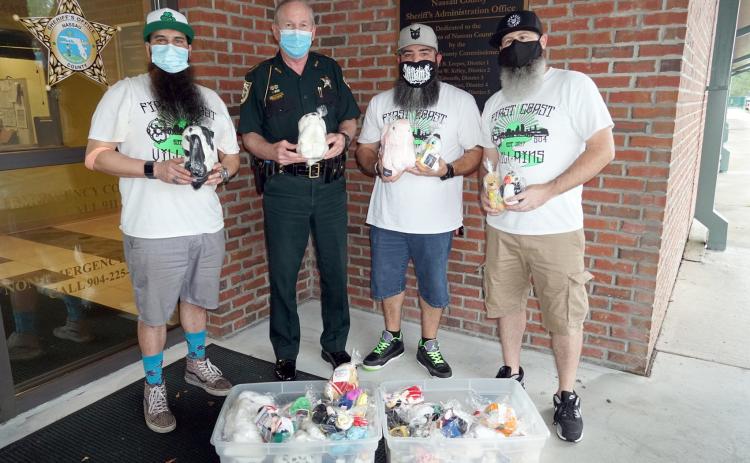 The Bearded Villains Volunteer Group delivers a little over 100 beanie babies, sanitized and prepackaged, to the Nassau County Sheriff’s Office for deputies to distribute to children in the community. These were donated by Katherine Hargesheimer and her family.