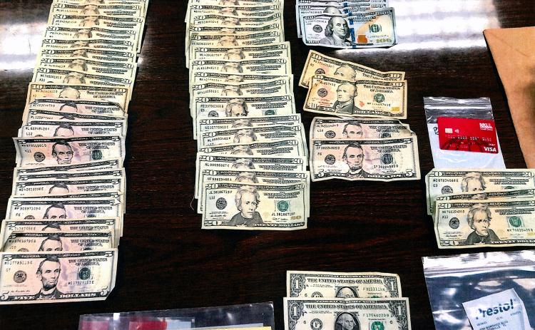 U.S. currency, several cell phones and drugs are among the evidence recovered after the chase. Photo courtesy of the Nassau County Sheriff’s Office