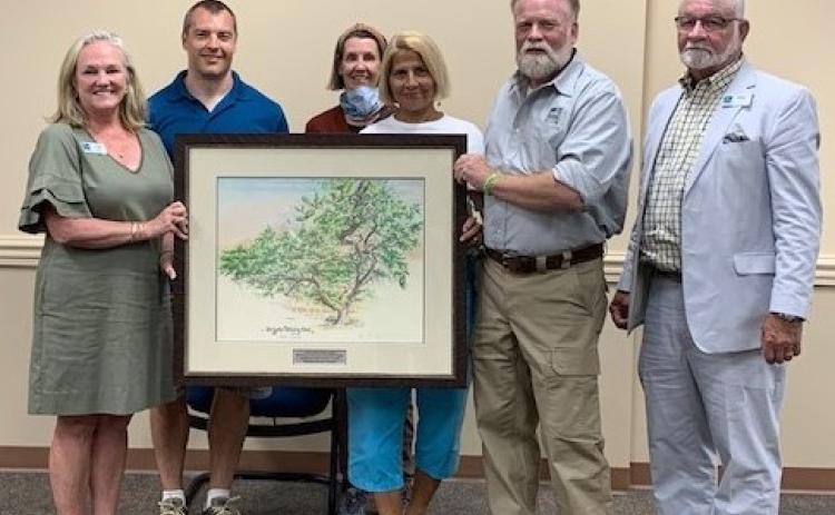 Keep Nassau Beautiful was recently honored by the Florida Urban Forestry Council’s Friends of Our Urban Forest Awards. From left are Keep Nassau Beautiful Executive Director Lynda Bell, Keep Nassau Beautiful Chadd Scott, Kelley McCarter and Margo Story, Florida Urban Forest Council President and Keep Nassau Beautiful member Mike Cole.