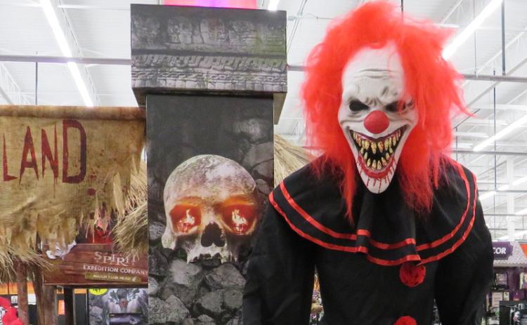 A clown gives an enthusiastic greeting to customers as they step into the scary experience that is Spirit of Halloween. JULIA ROBERTS/NEWS-LEADER