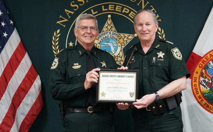 Roy Henderson, left, and Nassau County Sheriff Bill Leeper.