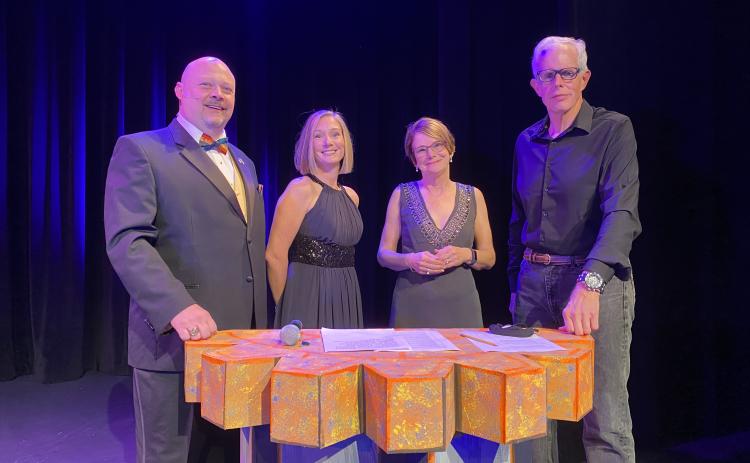 Nassau County Tax Collector John Drew, from left, was the master of ceremonies for the Take Stock in Children – Nassau County Home Grown Virtual Gala. He was joined by Executive Director Robin Lentz, board chairwoman Regina Lee and videographer Bob Eberle.
