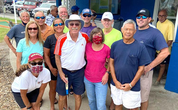 Jim Last had lots of support from his pickleball family during the 61st annual Professional Putters Association Championship week on Amelia Island. Pictured are, front row from left, Cyndi Teitelbaum, Last, Mary Jean Last, Ed Eng; second row, Chmone Ashley, Cyndi Roberts, Art Nichols, Chris Gamble; third row, Kevin O’Connor, Steve Ashley, Dan Broome, Gary Calhoun; and, far back right, PPA Commissioner Joe Aboid. SUBMITTED PHOTO