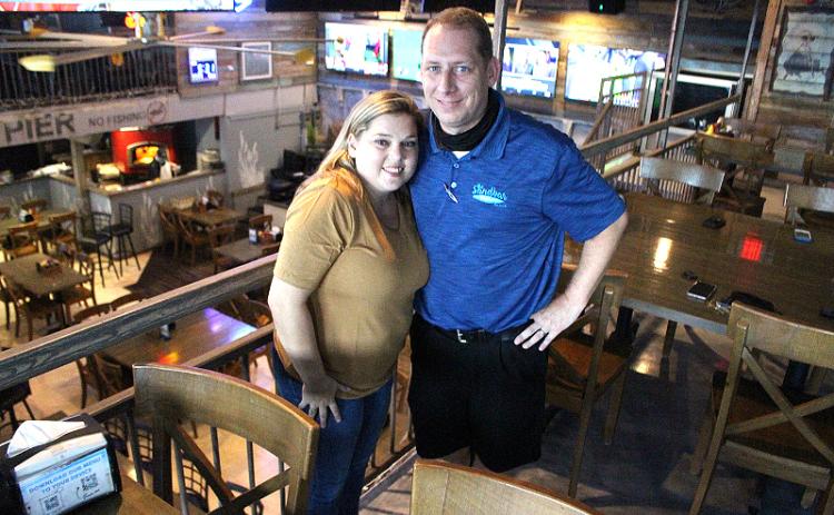 Sabrina and Joey Helms chose to honor their son’s legacy by organizing a charity golf tournament to benefit the Collin Helms Memorial Scholarship Fund, which will award scholarship money to Fernandina Beach High School baseball players. BETH JONES/NEWS-LEADER