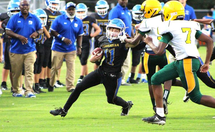 Alex Pulwicz scored a touchdown for the FBMS Pirates Thursday. BETH JONES/NEWS-LEADER