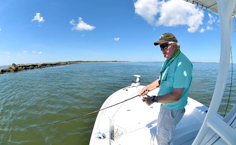 Keith Williams loves his 24-foot Yellowfin bay boat powered by a 300-hp Mercury V-8 outboard. The step hull allows for better fuel efficiency and speedy navigation to his fishing holes. TERRY LACOSS/FOR THE NEWS-LEADER