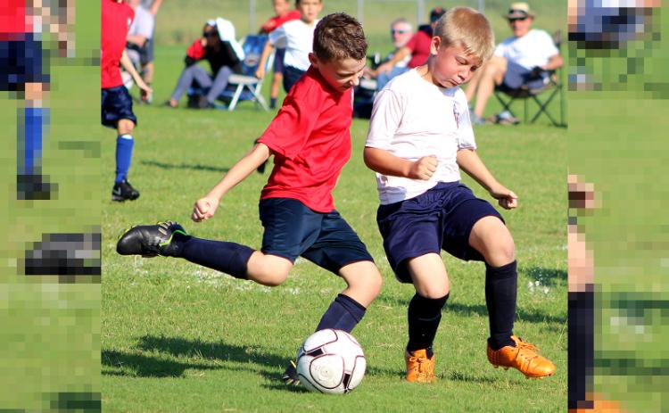 Children competing in Amelia Island Youth Soccer at play last fall at the soccer fields on Bailey Road. BETH JONES/NEWS-LEADER