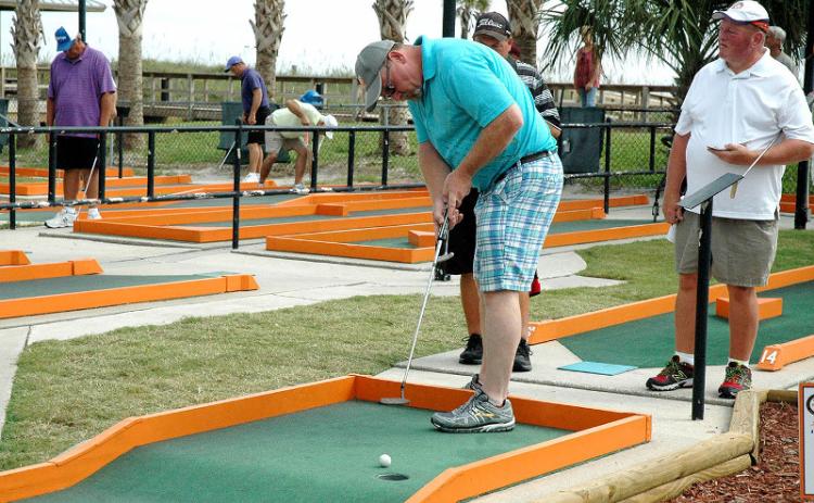 Professional and amateur putters met at Putt-Putt at Main Beach in September 2015 to compete in the 56th annual Professional Putters Association national championship. The PPA returns Sept. 14 for the 61st annual national championship. Joe Lea, above right, won in 2015. More photos, 7B. BETH JONES/NEWS-LEADER