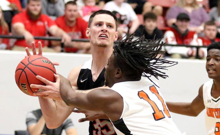 Jacob Crews in action at state for the Hilliard Flashes. The 6-foot-7 guard is the all-county boys basketball team’s most valuable player for the third year in a row. Brian LaCross/special