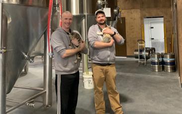 Mocama Brewing Company’s Simon Muldoon, left, and J.T. Murrett hold their new brewery additions.