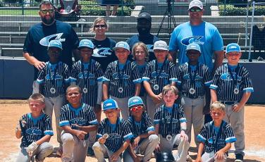 After winning the Class B District 2 tournament, the Camden County 8-U baseball squad won three of five games at the Class A/B machine pitch state tourney last week in Statesboro. (Submitted photo) 