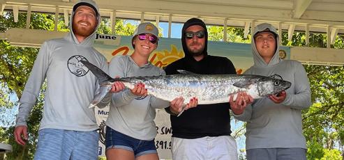 From left are Jon Epstein, Caroline Childress, Robert Southwick and Colton Bartlett with a 28.64-pound kingfish, the largest caught last Saturday at the Historic St. Marys Fishing Classic. (Submitted photo)