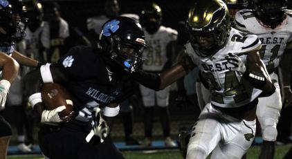 Ja'Marley Riddle gains some of Camden County's 247 rushing yards last Friday. (Andy Diffenderfer, Tribune & Georgian)