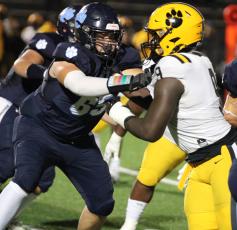 Camden County offensive lineman Gavin Wright battles Valdosta’s Eric Brantley in the trenches last Friday. (Andy Diffenderfer, Tribune & Georgian)