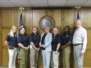 Women leaders in the Camden County Sheriff’s Office include, from left, 911 Center Director Capt. Holly Douglas, School Resource Deputies Cpl. Anita Chavez and Sgt. Felicia Buie, Criminal Investigation Division Commander Capt. Harritte Sirmon, Evidence Technician Cpl. Jeanie Jenkins and School Resource Deputies Supervisor and CHAMPS Program Director Lt. Kizzler Knight.