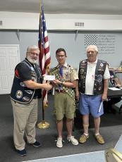 Camden County High School sophomore Braydon Smith, center, was honored as the VFW Georgia Eagle Scout of the Year. With Smith are Keith Post, left, and Dennis Gagliardi.