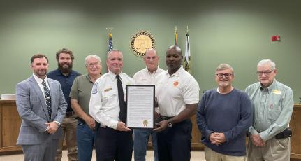 Administrator Shawn Boatright, Camden County Commissioners Trevor Readdick and Lannie Brant, Fire Safety Specialist Lt. Chris Goebel, Camden County Board of Commissioners Chairman Ben Casey, Fire Chief Terry Smith, and Commissioners Martin Turner and Commissioner Jim Goodman celebrate Fire Prevention Week.