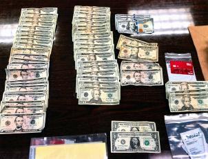 U.S. currency, several cell phones and drugs are among the evidence recovered after the chase. Photo courtesy of the Nassau County Sheriff’s Office