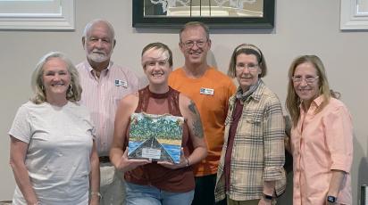 Keep Nassau Beautiful board members and staff celebrate their award, including Lynda Bell, Mike Cole, Jules Ruppel, Steven Gibb, Kelley McCarter and Jean Mauldin. 