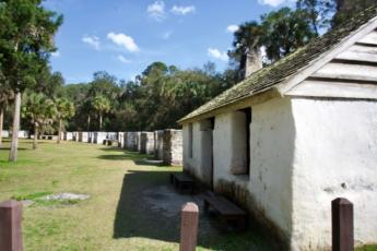 Slave quarters are arranged in a semicircle at Kingsley Plantation.