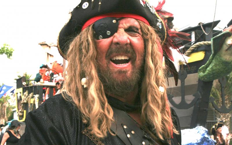 A pirate snarls at the 2019 Pirate parade to kick of Shrimp Festival weekend.  Peg Davis/News-Leader