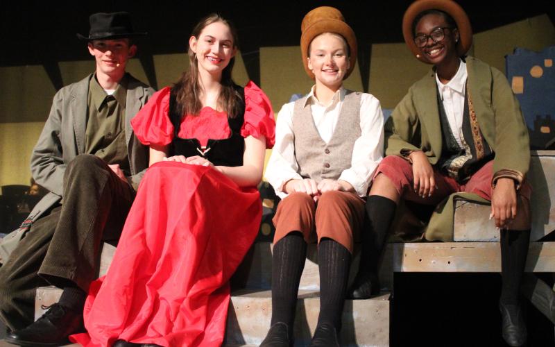 Jonathan Foreman (Fagin), from left, Lillie Reihing (Nancy), Aili Johnson (Oliver) and Sinaia’ Williams (The Artful Dodger) star in the Camden County High School Fine Arts Department’s weekend showing of “Oliver.”