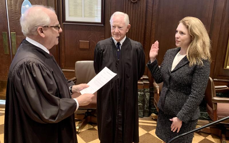 U.S. District Court Chief Judge J. Randal Hall administers the oath of office to Southern District of Georgia U.S. Attorney Jill E. Steinberg on Feb. 22 in the Federal Courthouse in Augusta, observed by U.S. District Court Judge Dudley H. Bowen.
