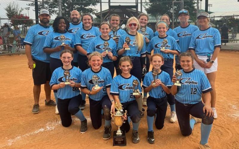 The Camden County 12-year-old softball team won the Class A/B District 2 championship Monday in Waycross and qualified for the state tournament next week in Statesboro. (Submitted photo)