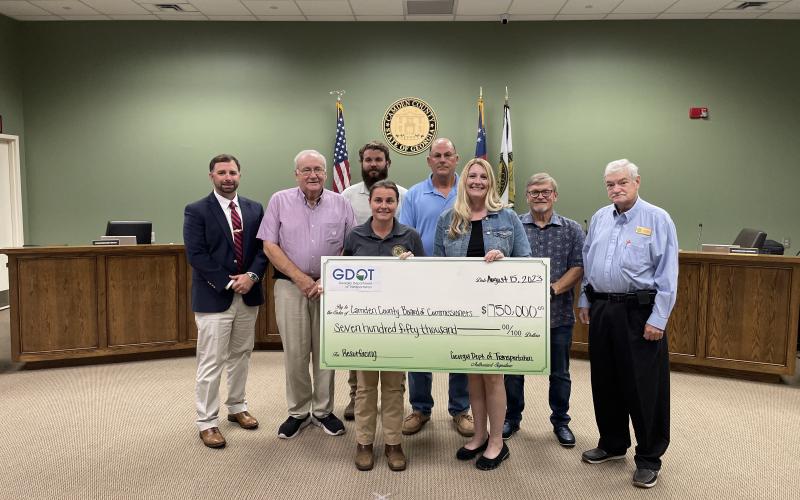 Camden County Board of Commissioners recently received $750,000 for Horse Stamp Church Road improvements. From left are County Administrator Shawn Boatright, Commissioners Lannie Brant and Trevor Readdick, Public Works Director Shalana McNamee, commission Chairman Ben Casey, Grants Manager Julie Haigler, and Commissioners Martin Turner and Jim Goodman.