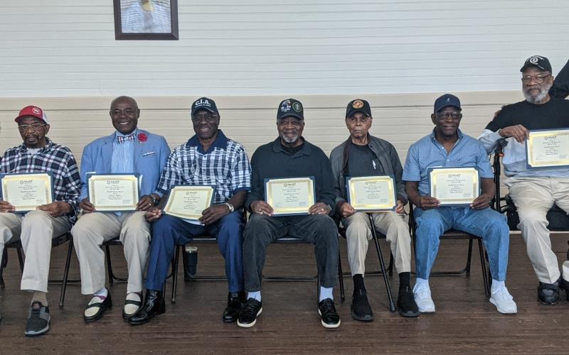 The NAACP Camden County Branch recently honored war veterans during its general membership meeting March 21. From left are NAACP Camden County Branch Armed Services and Veterans Affairs Committee Chairwoman Jannett Bradford, honorees Luther Walker, Vernon Higgins, Artie Jones Jr., A.J. Hilliard, Henry Horne Sr., Lewis Burch Sr. and Joe Bryant, and branch President Timothy Bessent Sr. Not pictured: Pastor Leon Washington, Ernest “Sarge” Stevens and Rick Lockamy.