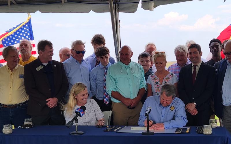 Gov. Brian Kemp signs a bill dubbing white shrimp as the official state crustacean.