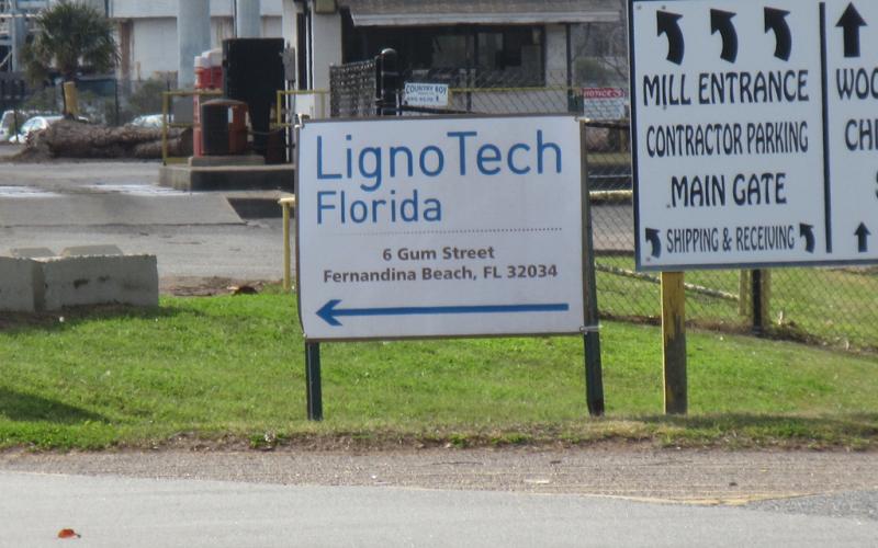 A file photo shows a sign marking the entrance to the LignoTech Florida plant in Fernandina Beach. JULIA ROBERTS/NEWS-LEADER