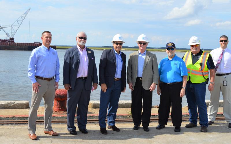 From left, Armand Riehl, senior project manager with Great Lakes Dredge & Dock Company; Ocean Highway and Port Authority Vice Chairman Mike Cole; Port of Fernandina Director Christopher Ragucci, who is also CEO of Worldwide Terminal Fernandina; Rutherford; Ocean Highway and Port Authority Chairman Danny Fullwood, Port of Fernandina Terminal Manager Roy E. Nelson; Beau Corbett, a project manager with the Army Corps of Engineers Jacksonville Office.  John Schaffner/For the News-Leader