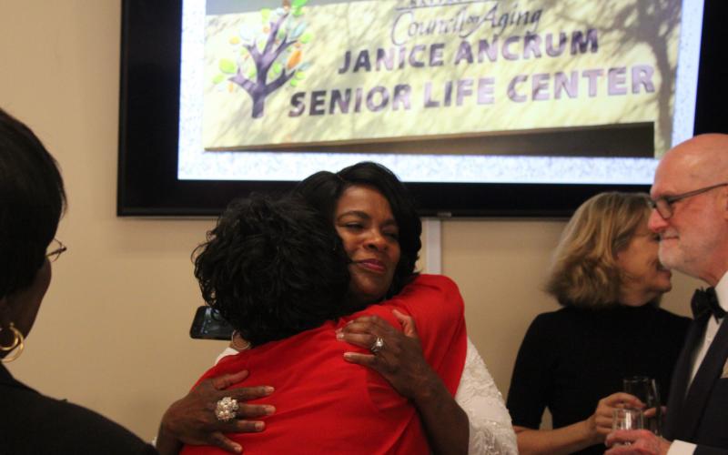 Janice Ancrum hugs her best friend of 35 years, Shirley Moore. 
