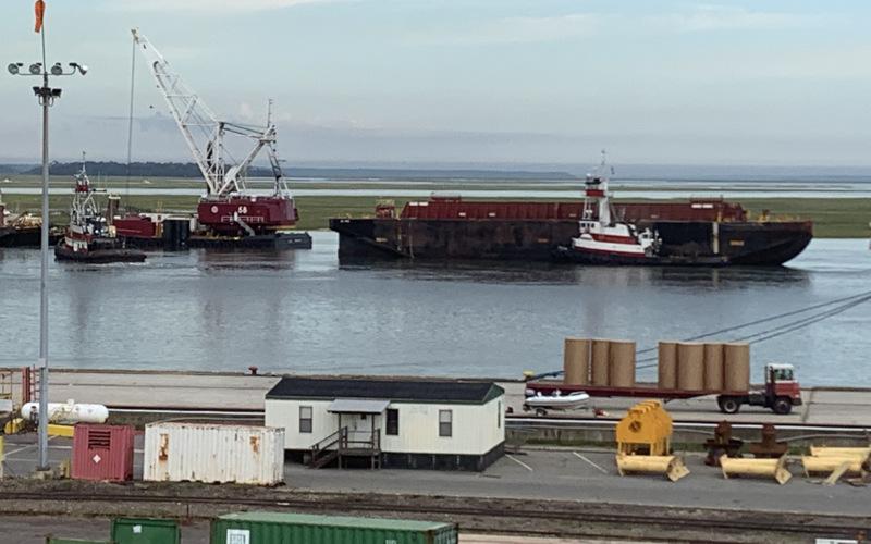 A clamshell bucket dredge and three ocean-going scows moved 400,000 cubic yards of material during a recent dredge of the Port of Fernandina, which will allow the port to receive ships with a draft of up to 40 feet. WORLDWIDE TERMINALS FERNANDINA