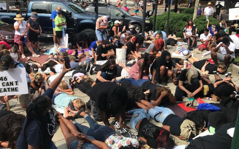 In a gesture of solidarity, protesters took a knee, observed silence or laid on the ground in the same position as George Floyd for eight minutes and 46 seconds, the length of time a Minneapolis police officer knelt on Floyd’s neck while other officers and bystanders watched. MIKE LEARY/SPECIAL FOR THE NEWS-LEADER