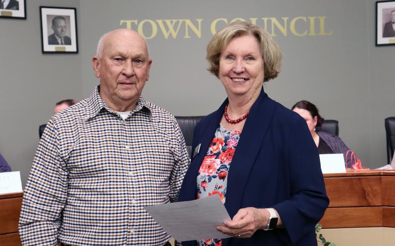 Take Stock in Children Mentor Trainer Dotti Williams receives a proclamation from Hilliard Mayor Floyd Vanzant.