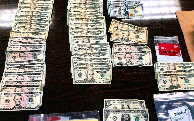 U.S. currency, several cell phones and drugs are among the evidence recovered after the chase. Photo courtesy of the Nassau County Sheriff’s Office