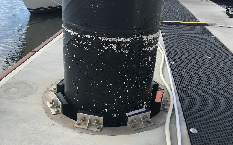 As the attenuator at the Fernandina Harbor Marina moves up and down with the tide, pieces of Styrofoam are visible, which appear to be from underneath the attenuator. JULIA ROBERTS/NEWS-LEADER
