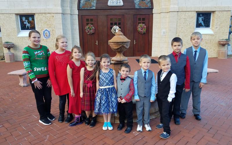 Barnabas continues to build partnerships with churches, civic groups and businesses in Nassau County to serve people in need during COVID-19. Jodie and her husband’s 10 adopted children are pictured.