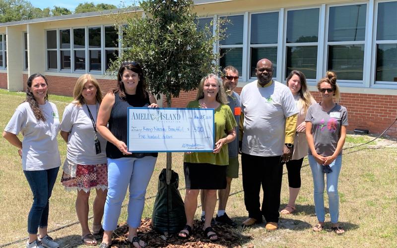 Keep Nassau Beautiful, with support from government, nonprofits and local businesses, recently planted trees at Fernandina Beach Middle School.